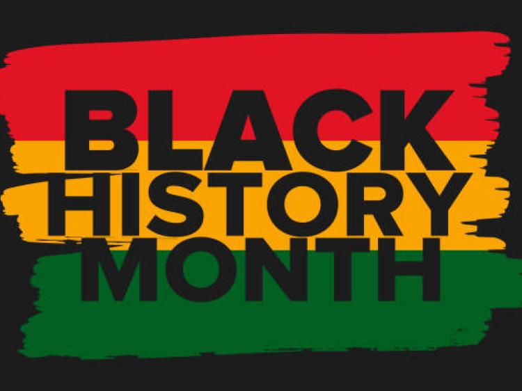 The words Black History Month on a black, red, yellow and green background