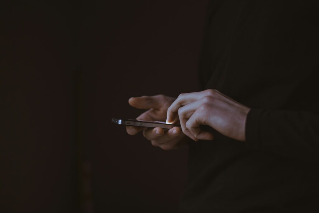 hands holding phone
