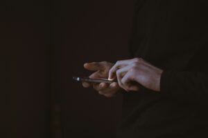 hands holding phone